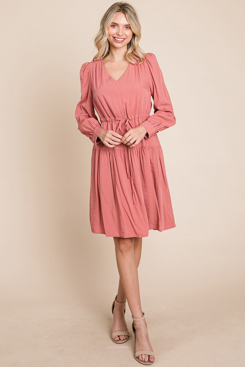 A stylish Long Sleeve Tiered Waist String Ruched Dress featuring a V-neck, long sleeves, and a tiered waist design, perfect for various occasions.