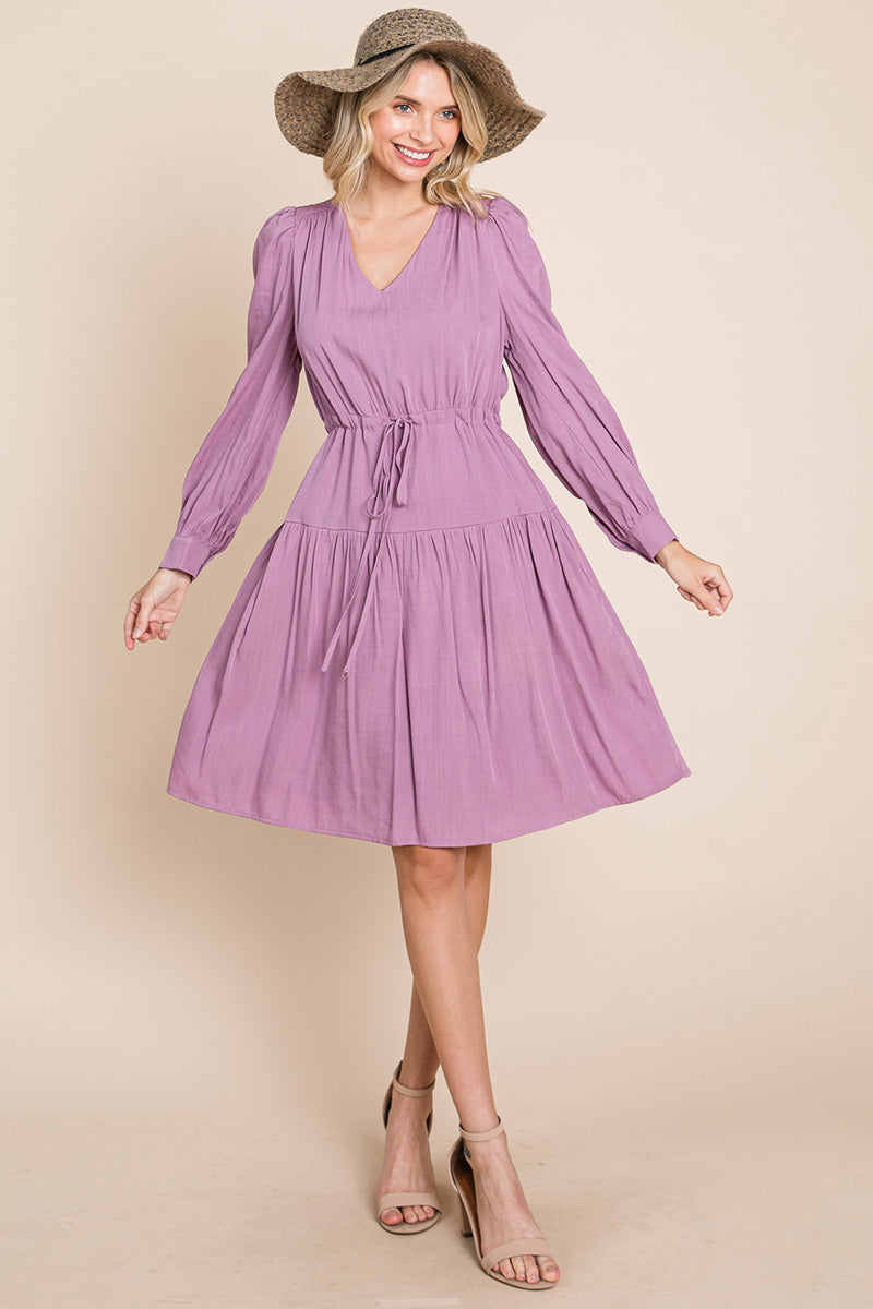 A stylish Long Sleeve Tiered Waist String Ruched Dress featuring a V-neck, long sleeves, and a tiered waist design, perfect for various occasions.