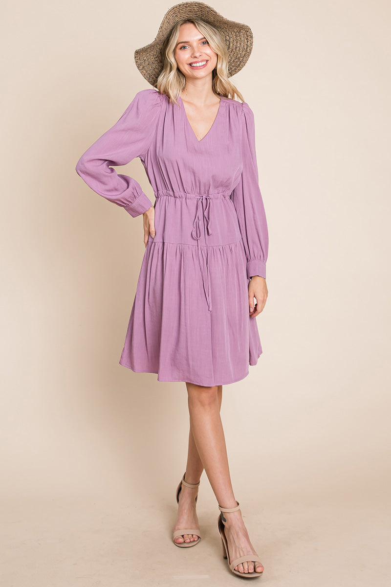 A stylish Long Sleeve Tiered Waist String Ruched Dress featuring a V-neck, long sleeves, and a tiered waist design, perfect for various occasions.