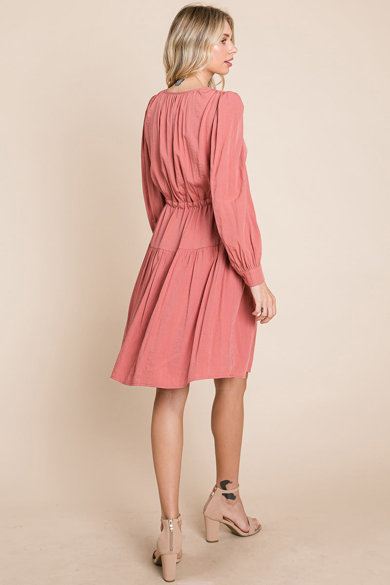 A stylish Long Sleeve Tiered Waist String Ruched Dress featuring a V-neck, long sleeves, and a tiered waist design, perfect for various occasions.