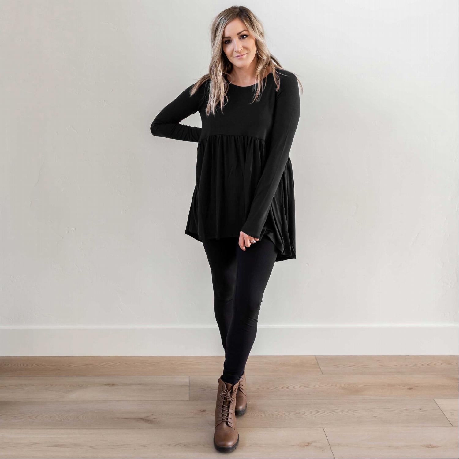 A stylish Long Sleeve With Waist Shirring Top featuring unique pleats and a round neck, perfect for casual or work wear.