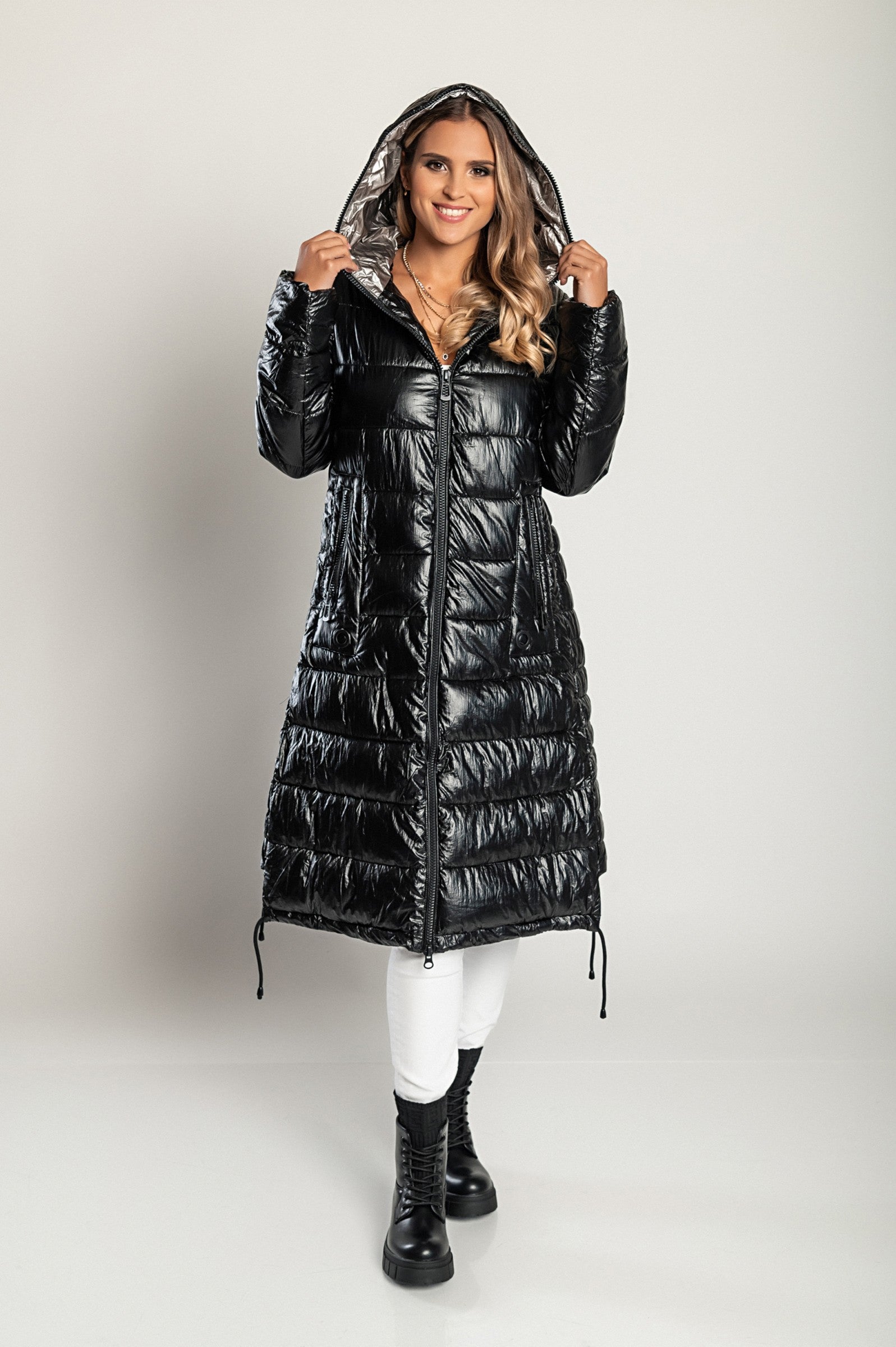 Long winter jacket with hood, item code 2237, in black, featuring a quilted design, high collar, and side zipper pockets.