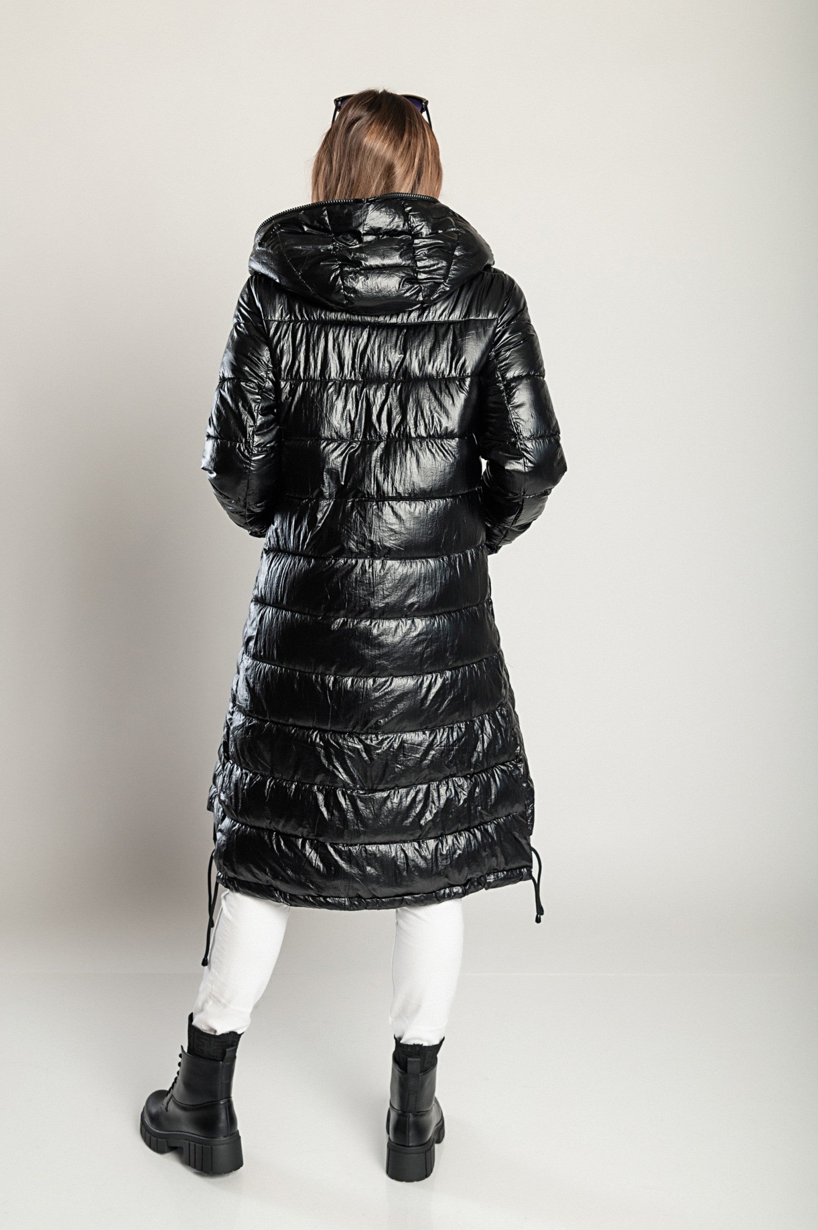 Long winter jacket with hood, item code 2237, in black, featuring a quilted design, high collar, and side zipper pockets.