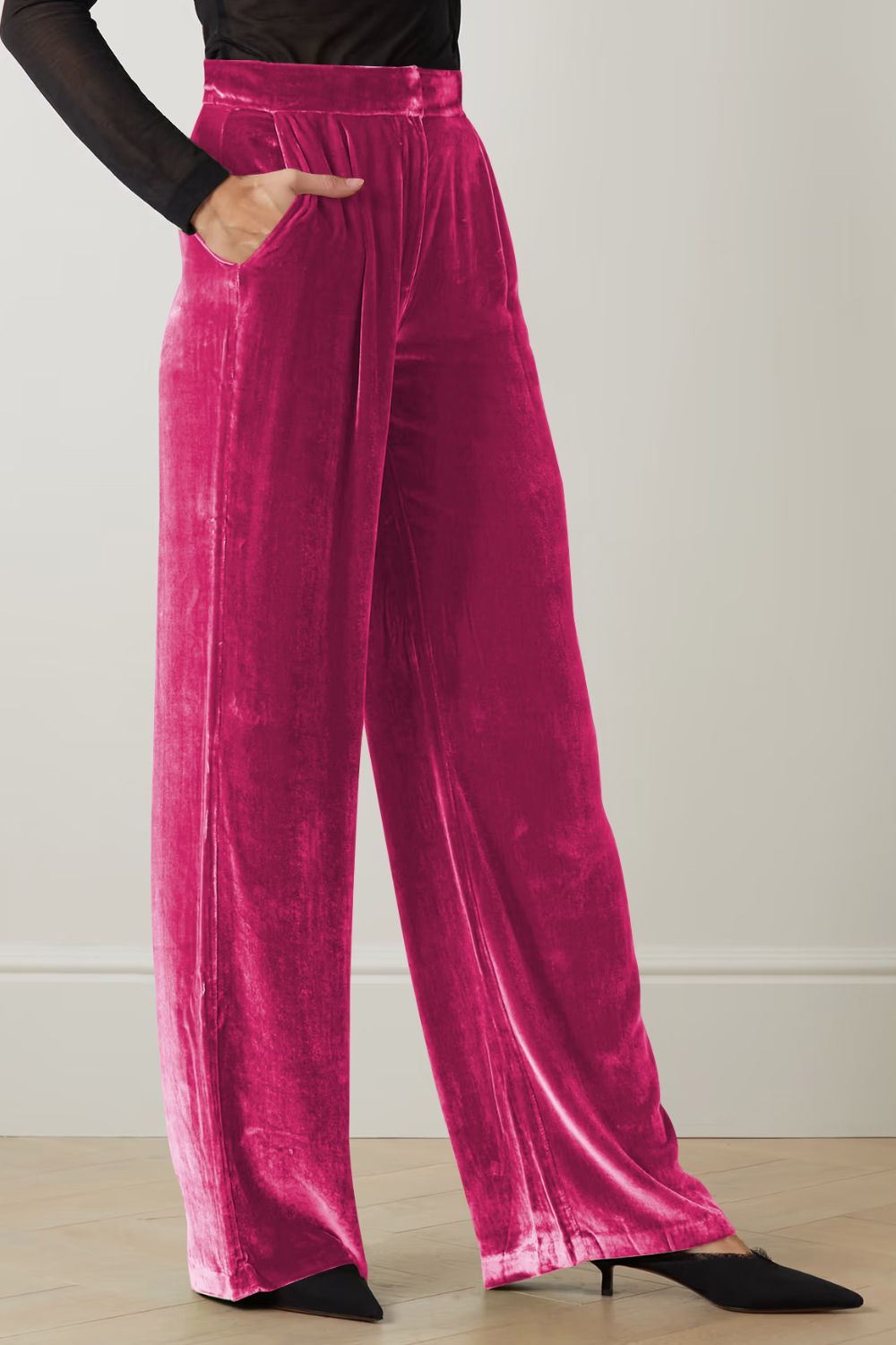 Loose fit high waist long pants in solid color with pockets, showcasing a chic and comfortable design.