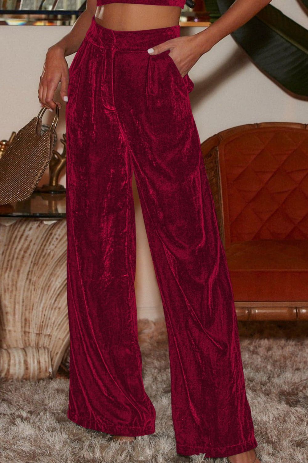 Loose fit high waist long pants in solid color with pockets, showcasing a chic and comfortable design.