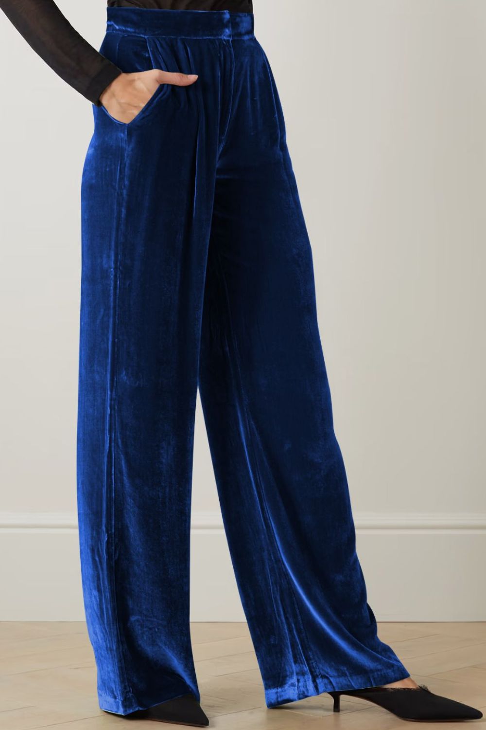 Loose fit high waist long pants in solid color with pockets, showcasing a chic and comfortable design.