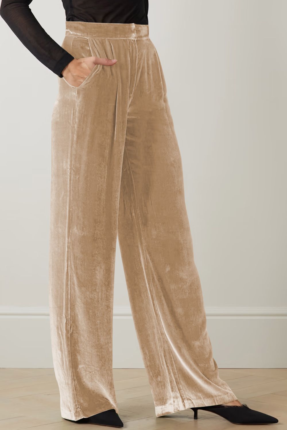 Loose fit high waist long pants in solid color with pockets, showcasing a chic and comfortable design.