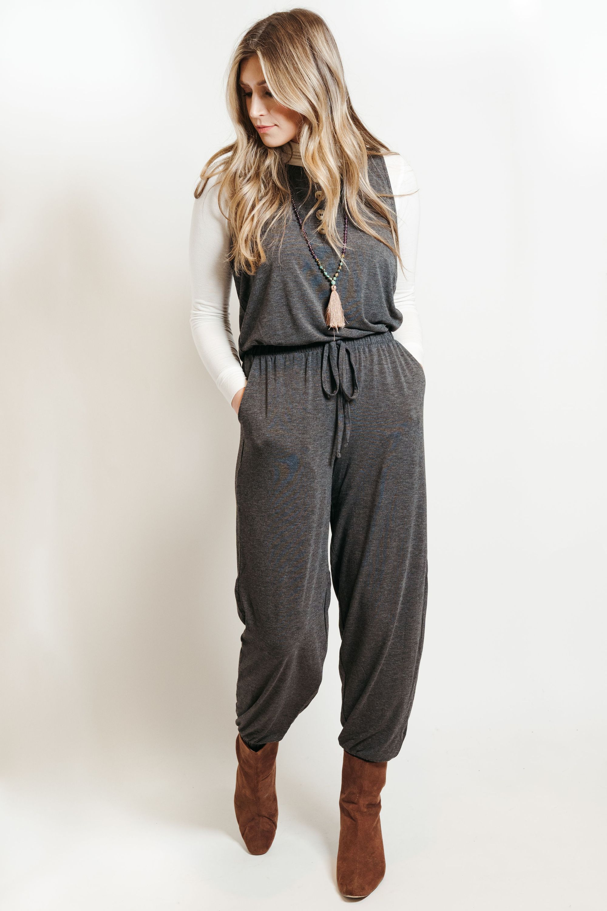 A stylish ash gray lounge jumpsuit, featuring a comfortable fit and versatile design, perfect for casual outings or lounging at home.