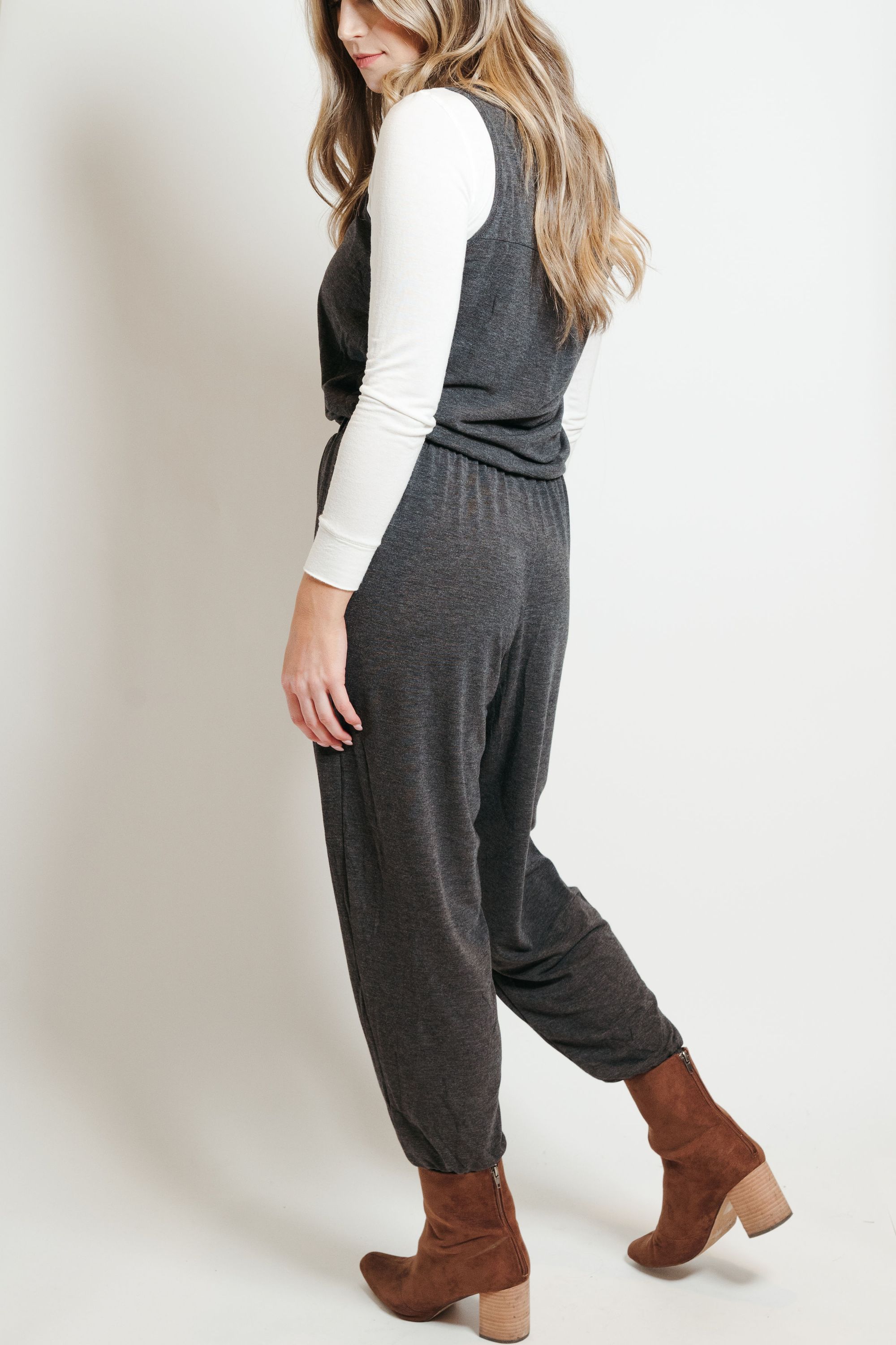 A stylish ash gray lounge jumpsuit, featuring a comfortable fit and versatile design, perfect for casual outings or lounging at home.