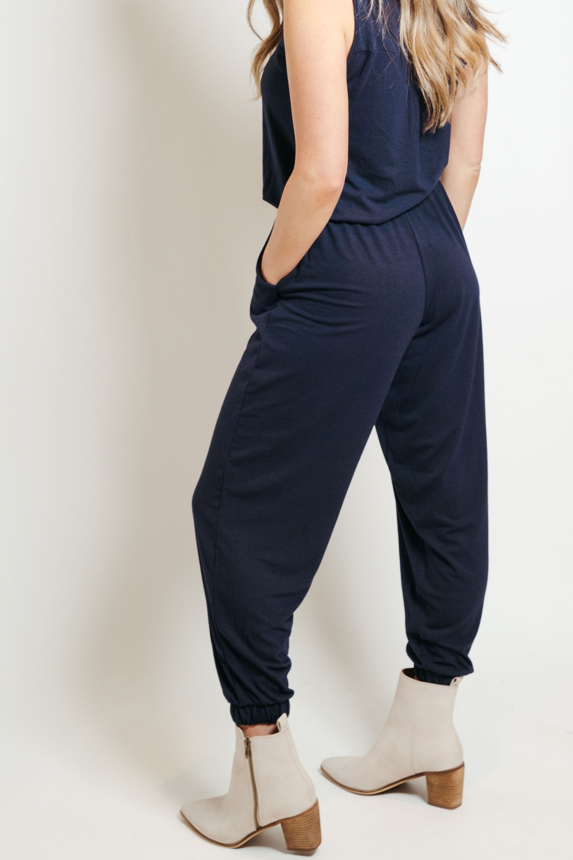 Navy Lounge Jumpsuit displayed on a mannequin, showcasing its comfortable fit and stylish design.