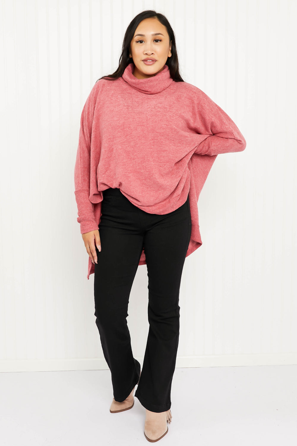 Cozy oversized Love and Cuddles Cowl Neck Poncho Sweater in a solid color, featuring a stylish cowl neck and high-low hem.