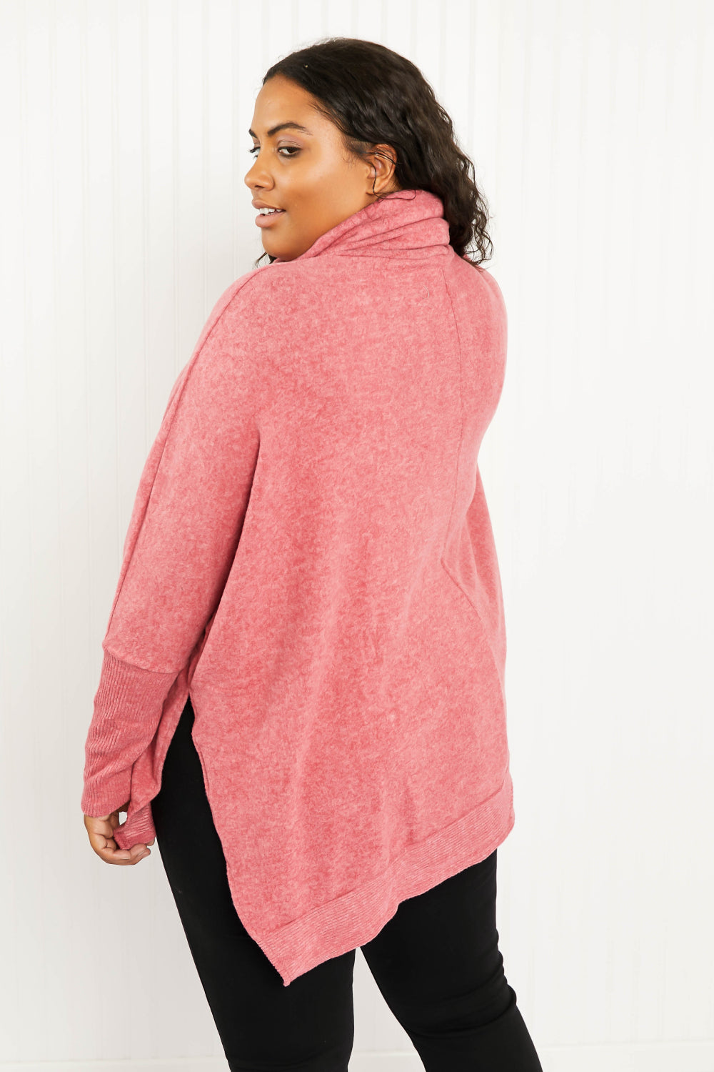 Cozy oversized Love and Cuddles Cowl Neck Poncho Sweater in a solid color, featuring a stylish cowl neck and high-low hem.