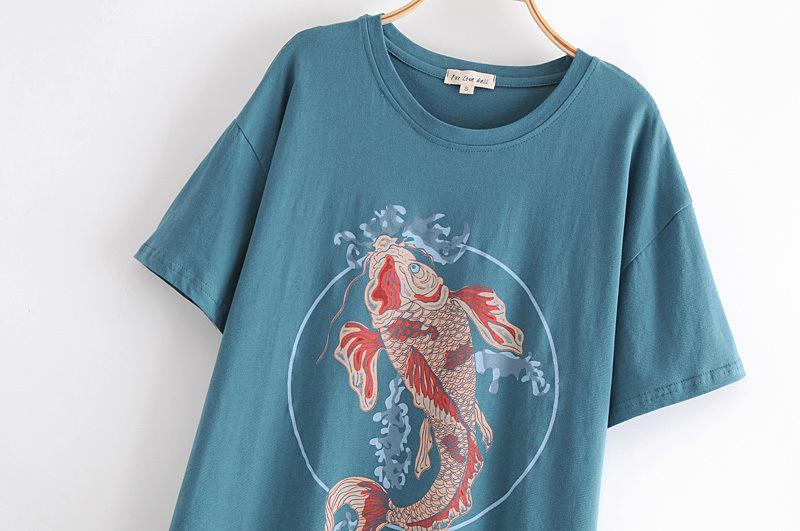 Love Pisces Oversized Graphic Tee in premium cotton with a rounded neckline and short sleeves, styled with ripped denim.