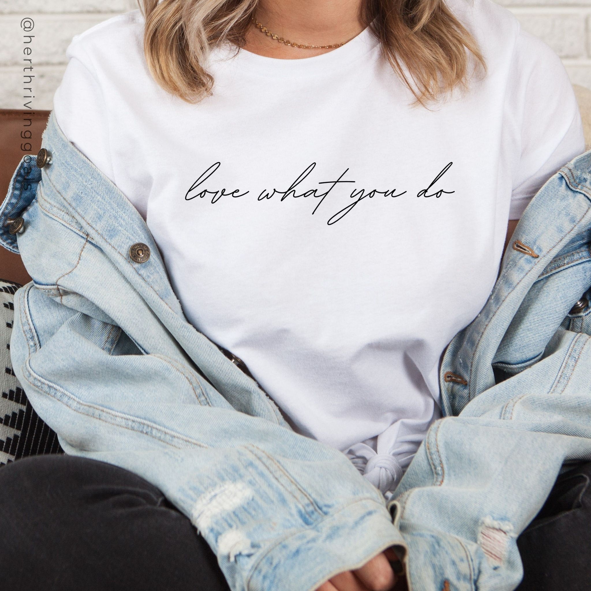 LOVE WHAT YOU DO TEE displayed on a mannequin, showcasing its unisex design and soft fabric.