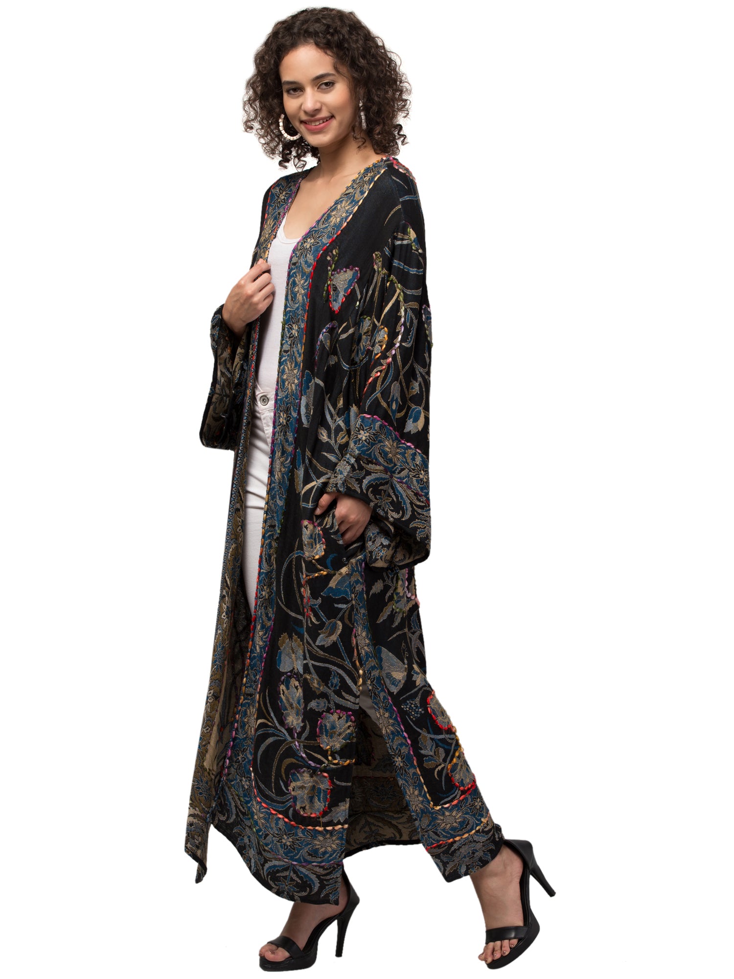 Luna Kimono Jacket featuring intricate hand-embroidered designs, showcasing vibrant colors and a flowing silhouette, perfect for bohemian fashion.