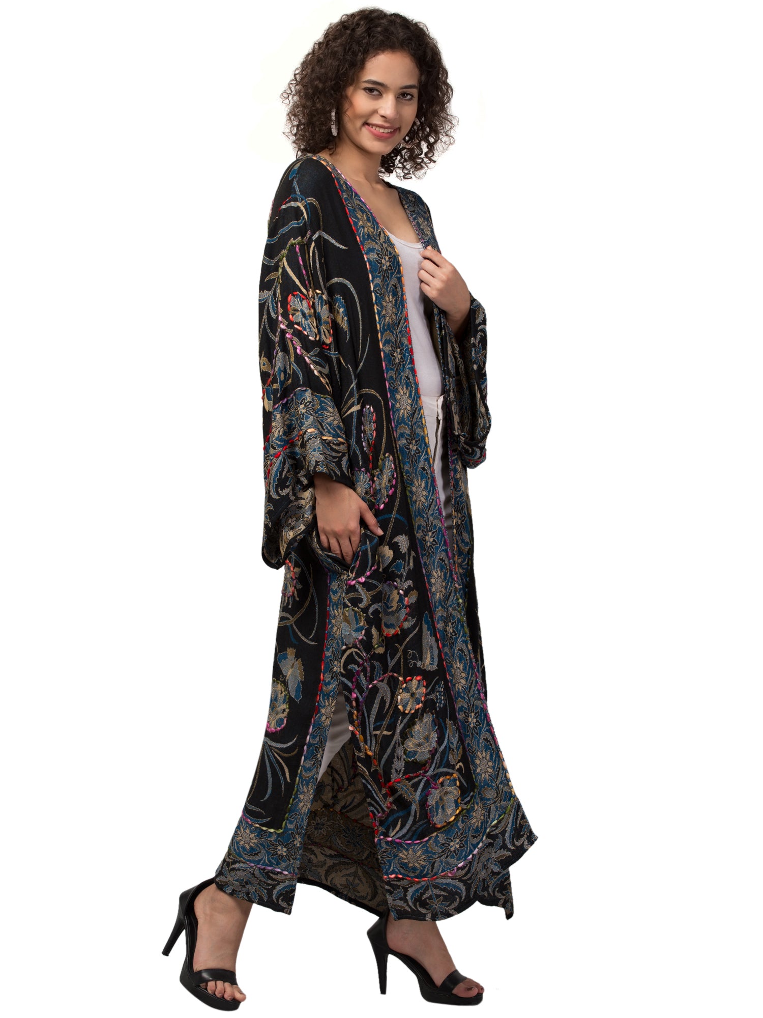 Luna Kimono Jacket featuring intricate hand-embroidered designs, showcasing vibrant colors and a flowing silhouette, perfect for bohemian fashion.