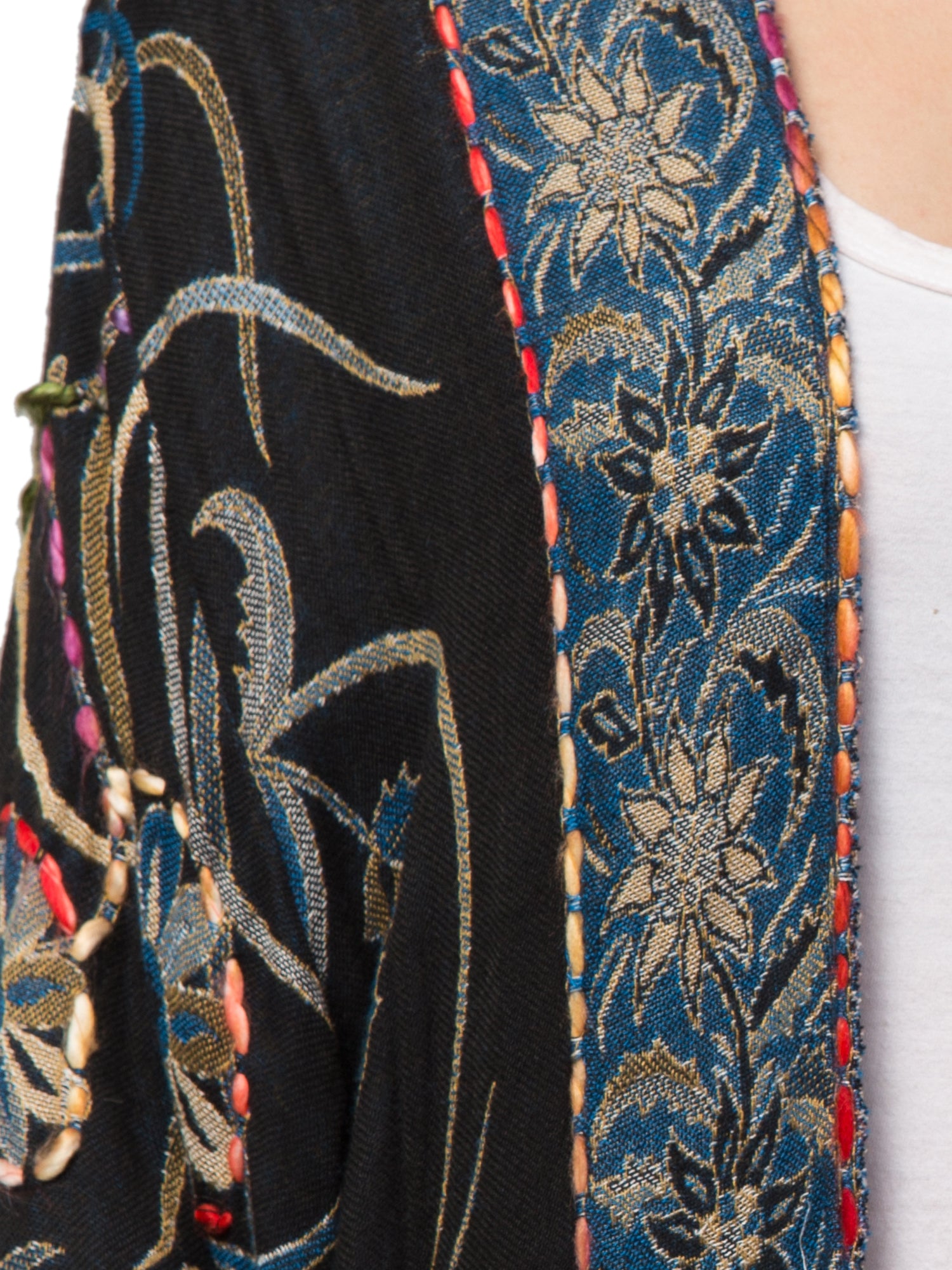 Luna Kimono Jacket featuring intricate hand-embroidered designs, showcasing vibrant colors and a flowing silhouette, perfect for bohemian fashion.