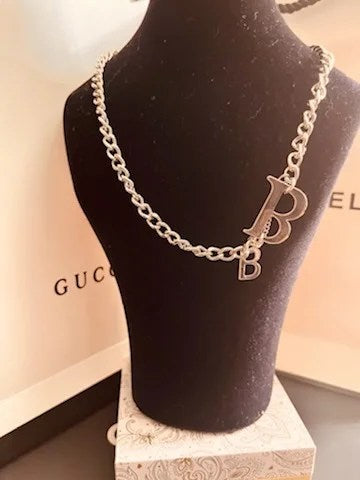 Lux Chain Pendant Necklace featuring a stylish silver chain, perfect for elegant outfits and occasions.