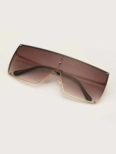 Lux Flat Top Sunglasses featuring a gold frame and brown lenses, designed in a stylish square shape.