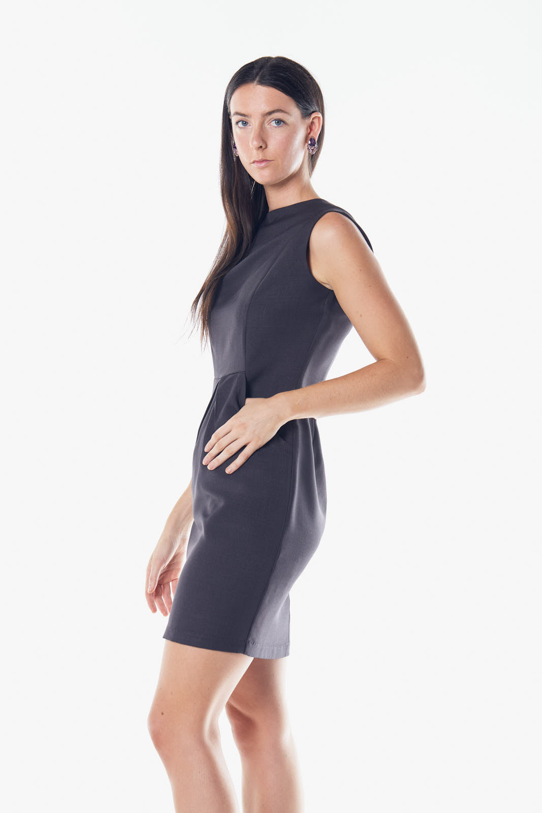 Luxe Wool Mini Dress in charcoal color, featuring pleated design and pockets, perfect for work and special occasions.