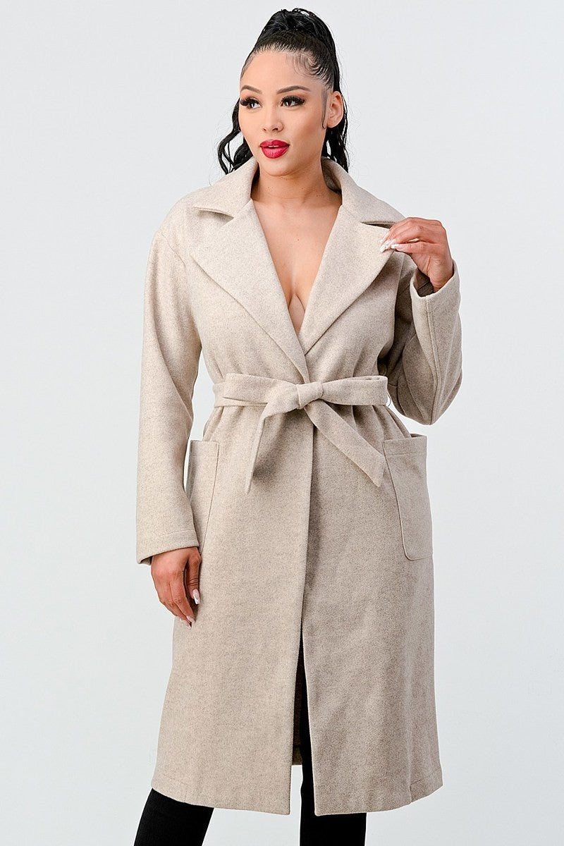 Luxe Wool Waist Tie Side Pockets Midi Length Coat in oatmeal color, showcasing its stylish design and waist tie feature.