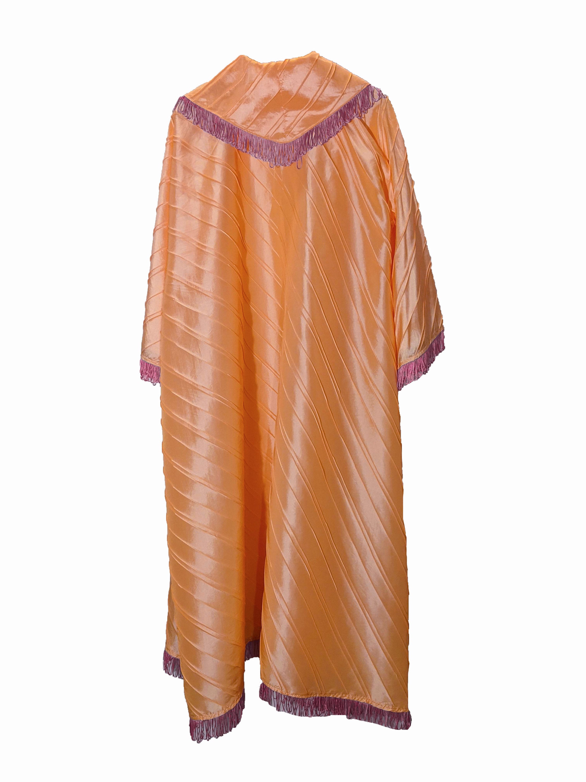 LYDAI salmon color taffeta outerwear with lilac fringes, showcasing elegant design and front closure detail.