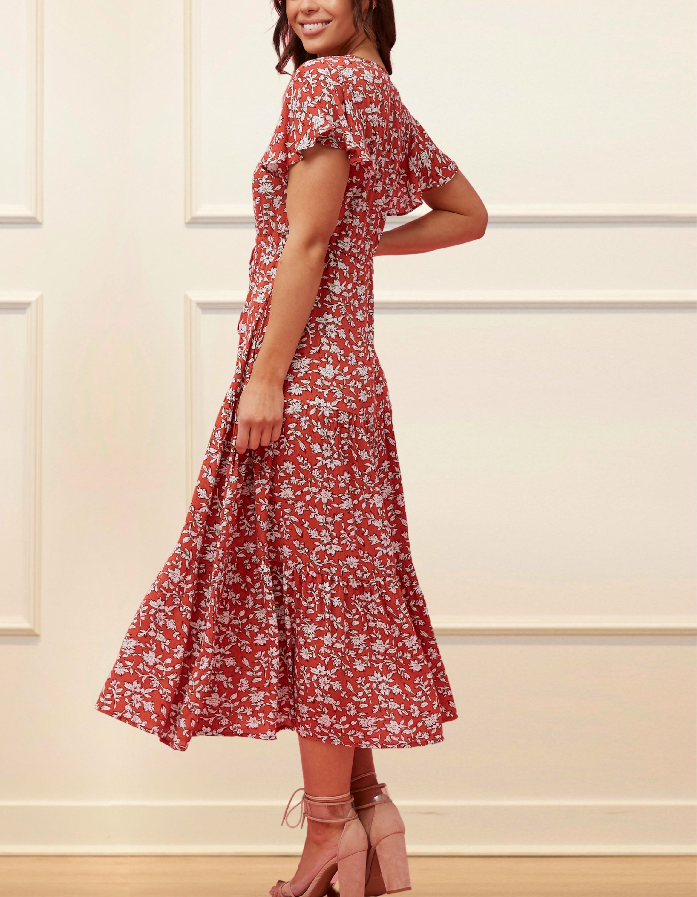 Lysandre Midi Dress in floral print rust with angel sleeves and tiered skirt, showcasing a stylish and comfortable design.