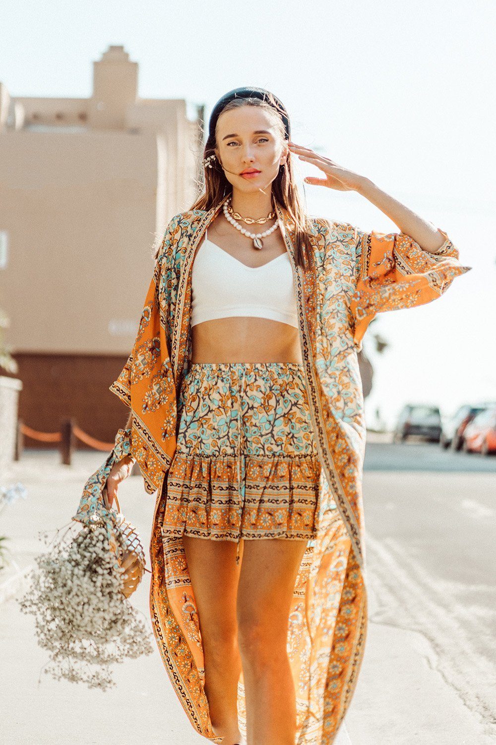 Mía Bohemian Floral Print Kimono Style Robe featuring a relaxed fit, open front with ties, and elegant kimono sleeves in a vibrant floral pattern.