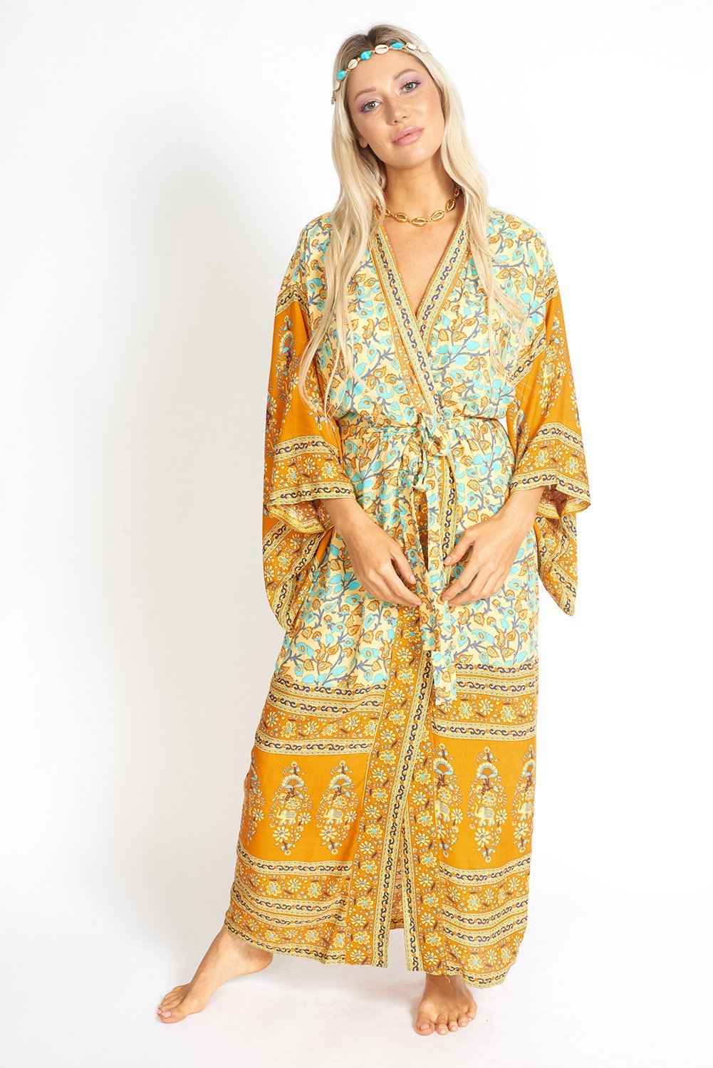 Mía Bohemian Floral Print Kimono Style Robe featuring a relaxed fit, open front with ties, and elegant kimono sleeves in a vibrant floral pattern.