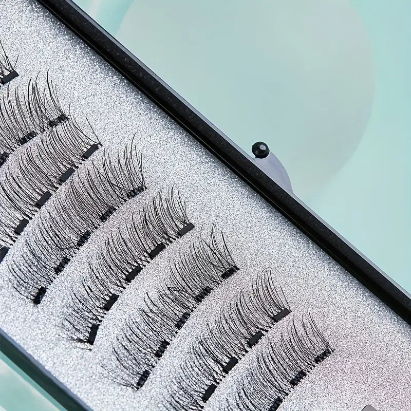 Magnetic Eyelash Kit featuring reusable false eyelashes and applicator tweezer for easy application.