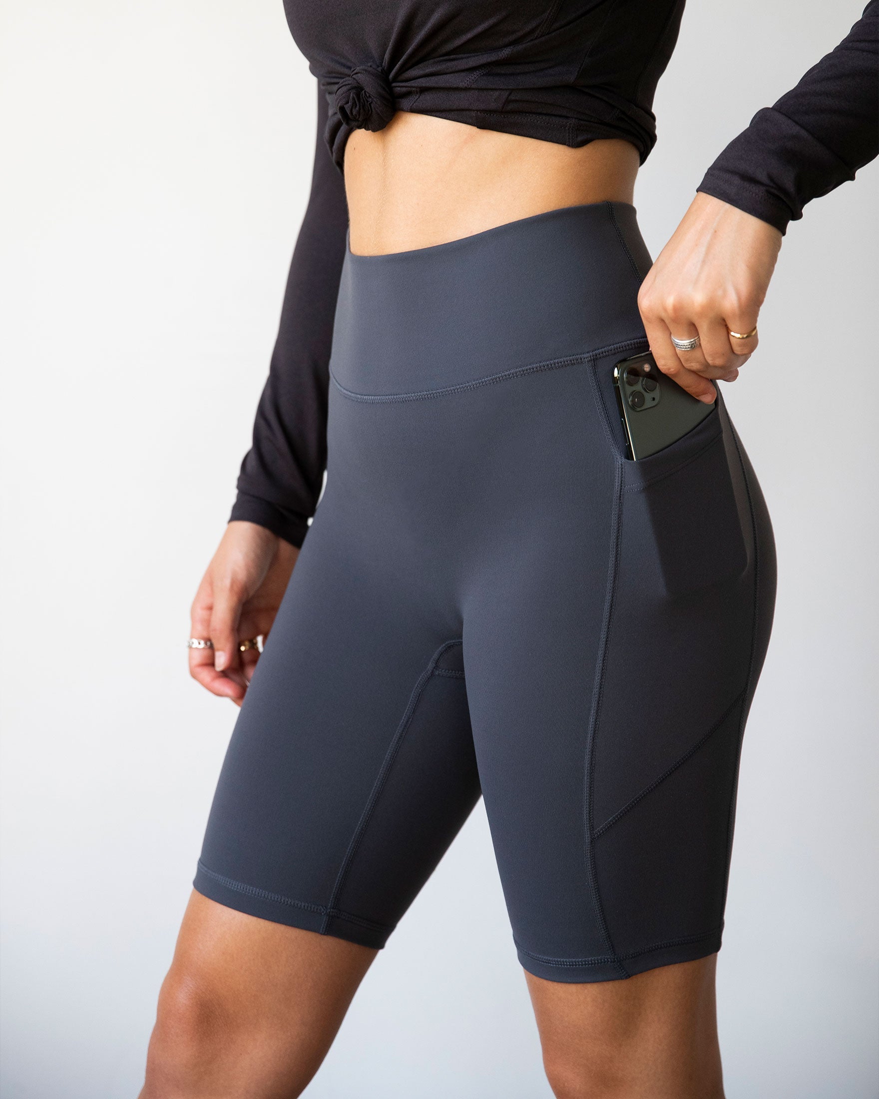 High-waisted Making Moves Pocket Biker Shorts in black, featuring a comfortable fit and side pockets, ideal for yoga and workouts.