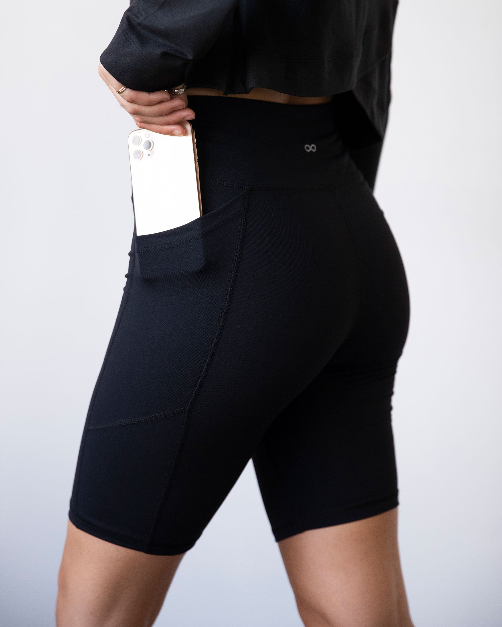 High-waisted Making Moves Pocket Biker Shorts in black, featuring a comfortable fit and side pockets, ideal for yoga and workouts.