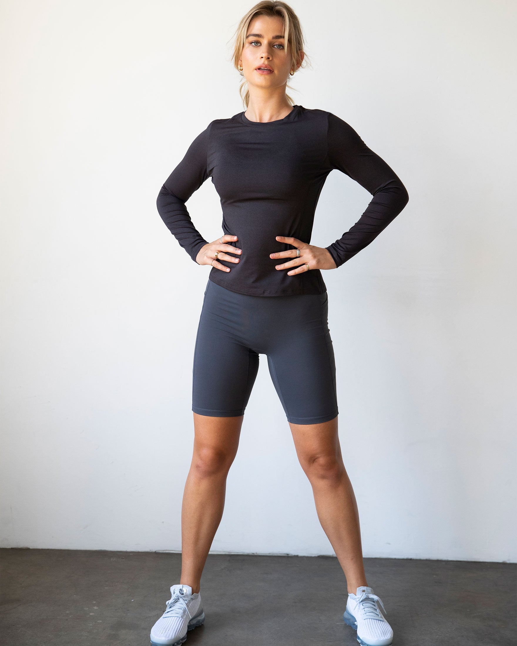 High-waisted Making Moves Pocket Biker Shorts in black, featuring a comfortable fit and side pockets, ideal for yoga and workouts.