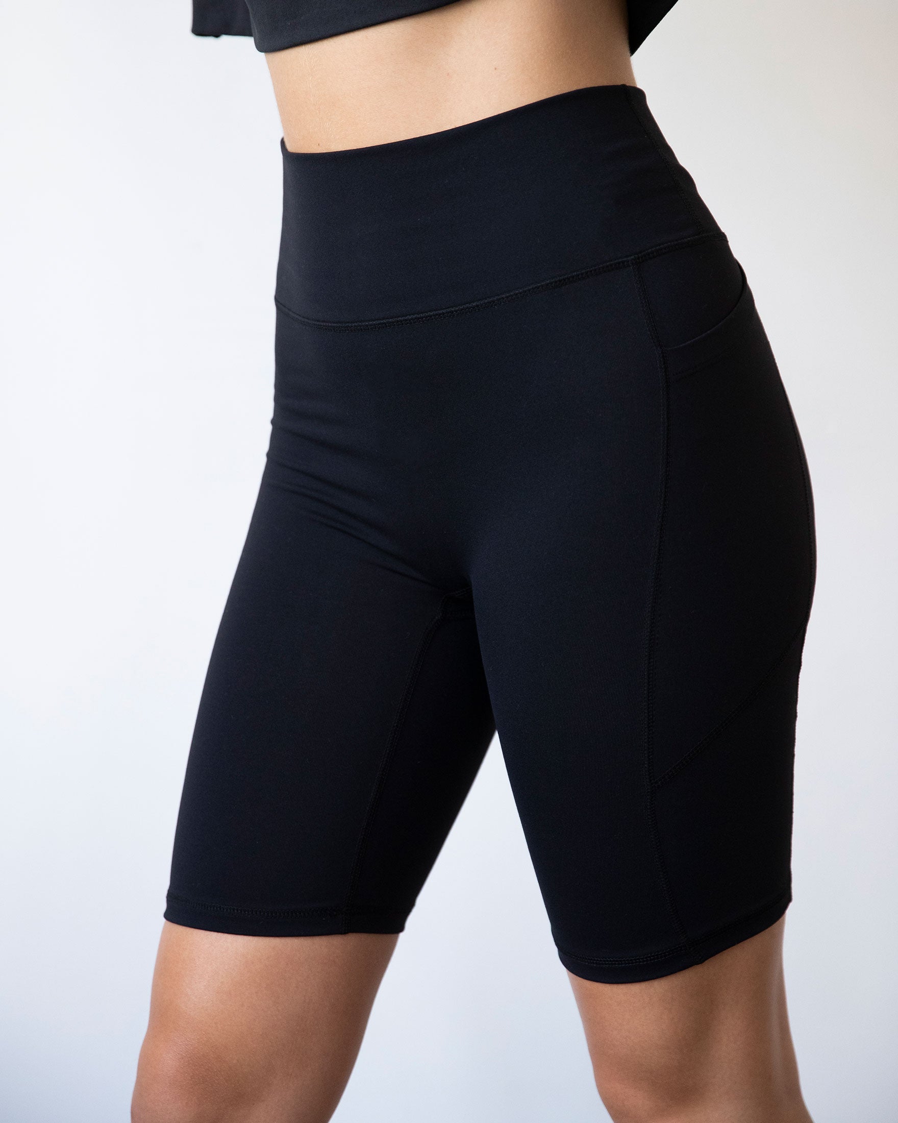 High-waisted Making Moves Pocket Biker Shorts in black, featuring a comfortable fit and side pockets, ideal for yoga and workouts.