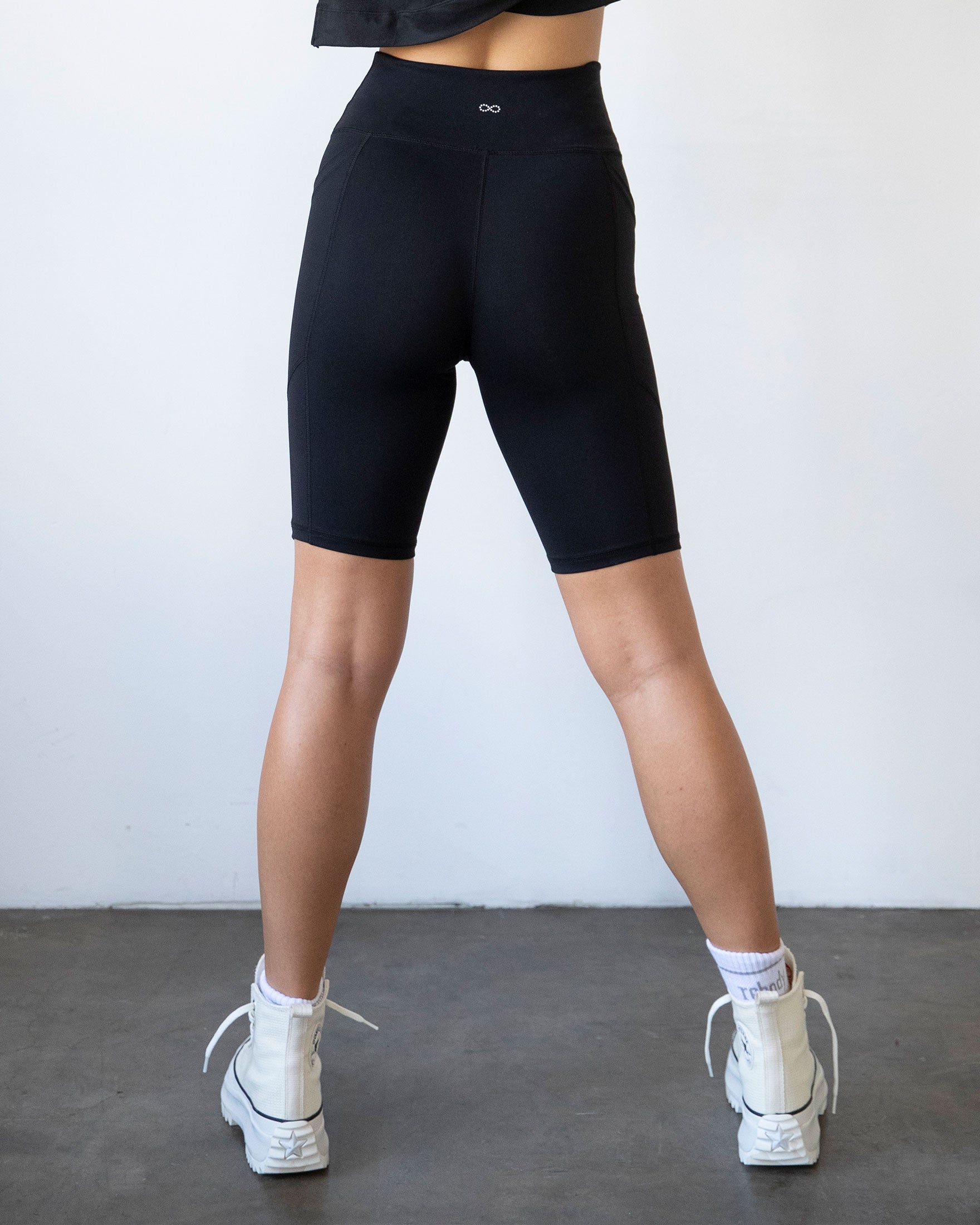 High-waisted Making Moves Pocket Biker Shorts in black, featuring a comfortable fit and side pockets, ideal for yoga and workouts.