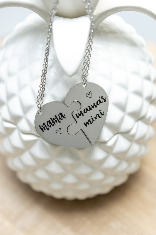 Mama & Mama's Mini Necklaces featuring stainless steel design with adjustable chain length.