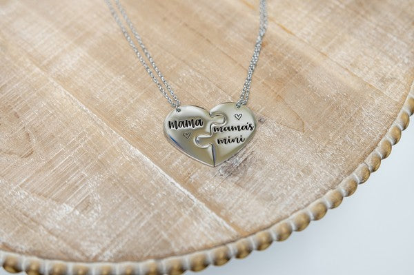 Mama & Mama's Mini Necklaces featuring stainless steel design with adjustable chain length.