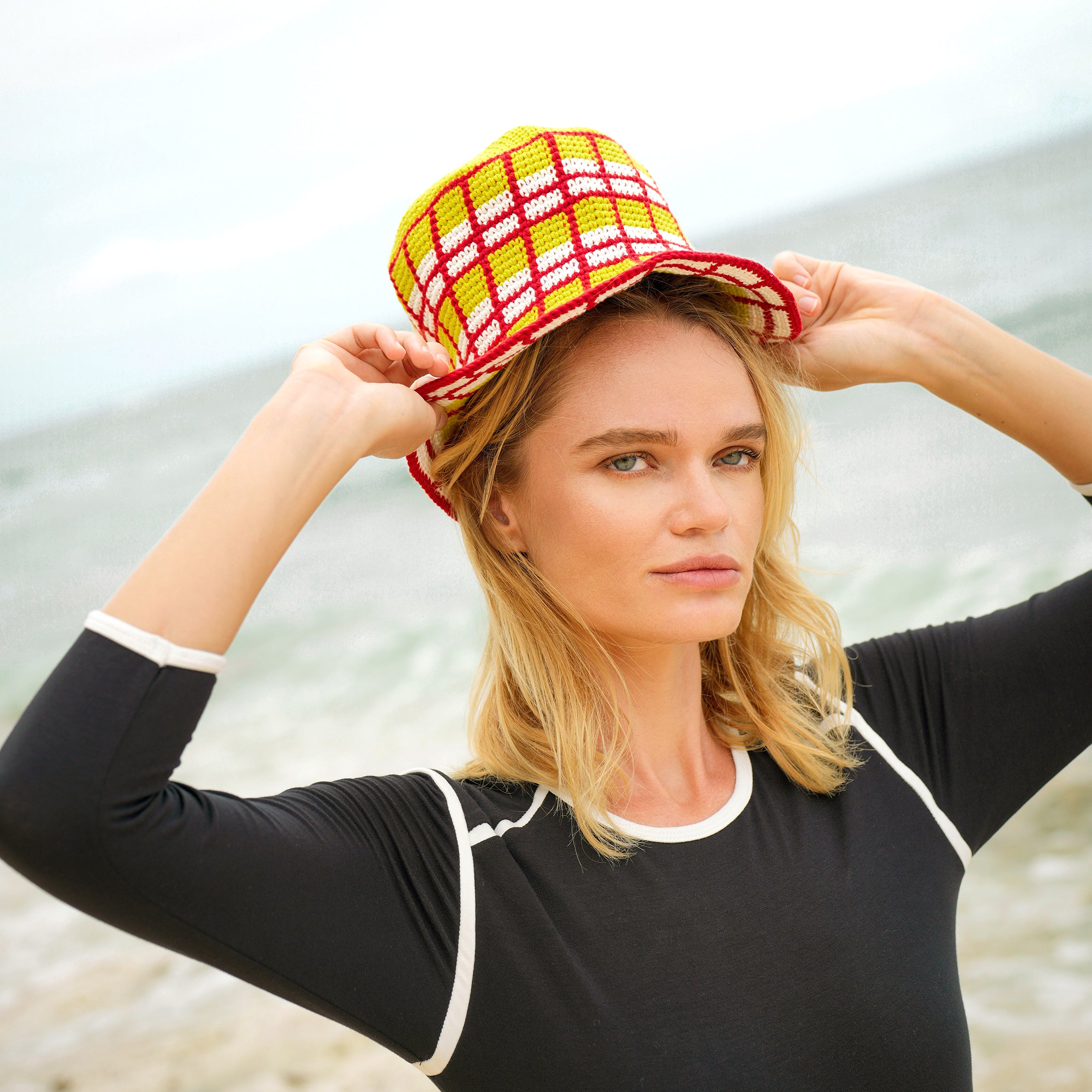 MARGARITA Plaid Crochet Hat in vibrant lime green and hot chili red, handcrafted by female artisans in Java, Indonesia.