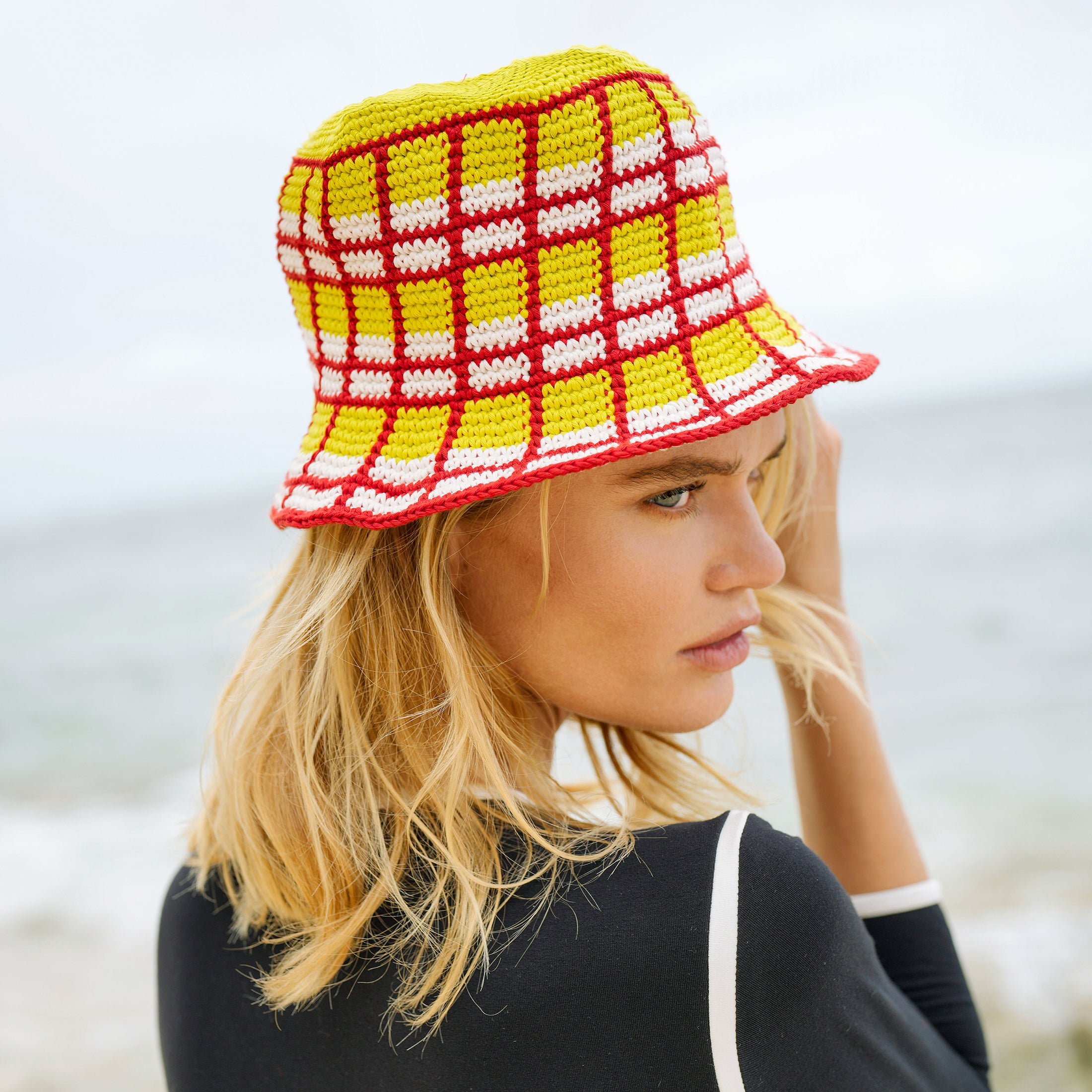 MARGARITA Plaid Crochet Hat in vibrant lime green and hot chili red, handcrafted by female artisans in Java, Indonesia.