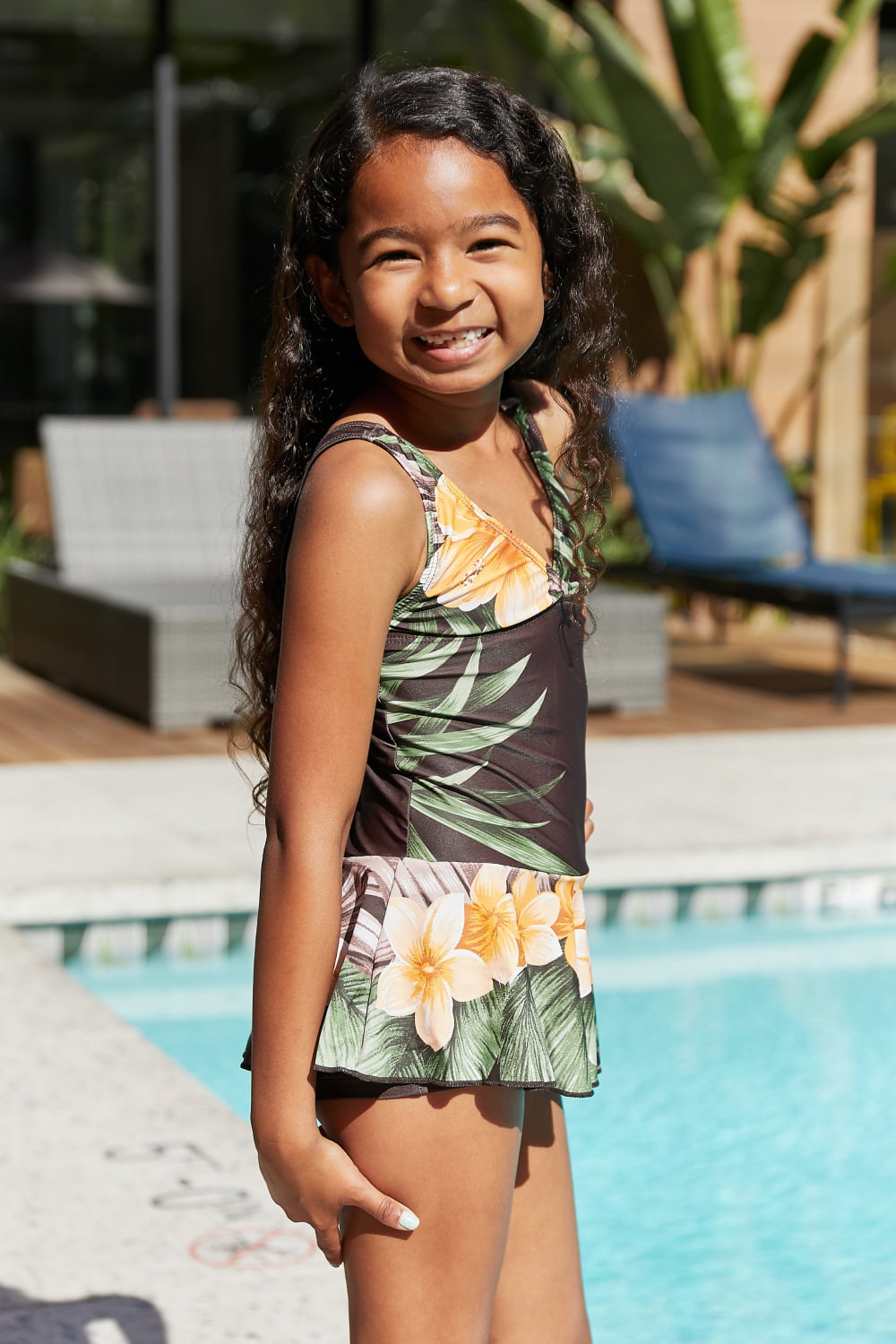 Marina West Swim Clear Waters Swim Dress in Aloha Brown featuring a floral pattern and built-in boyshorts, perfect for feminine swim days.