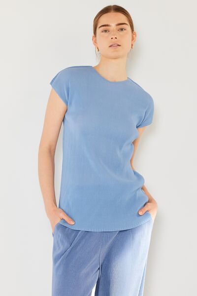 Marina West Swim Rib Pleated Cap Sleeve Top featuring ribbed texture and pleated details, perfect for stylish and versatile outfits.