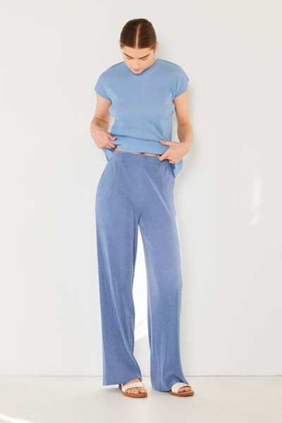 Marina West Swim Rib Pleated Elastic-Waist Wide Leg Pants showcasing ribbed texture and pleats in a stylish design.