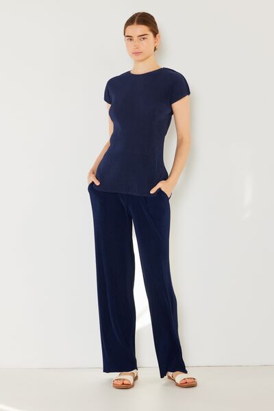 Marina West Swim Rib Pleated Elastic-Waist Wide Leg Pants showcasing ribbed texture and pleats in a stylish design.