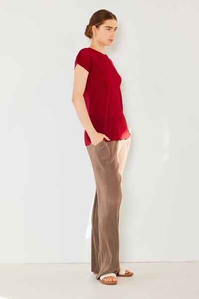 Marina West Swim Rib Pleated Elastic-Waist Wide Leg Pants showcasing ribbed texture and pleats in a stylish design.