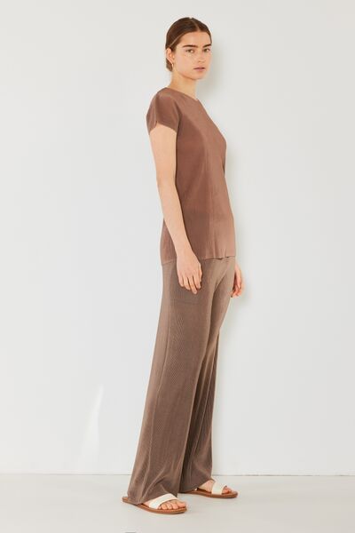 Marina West Swim Rib Pleated Elastic-Waist Wide Leg Pants showcasing ribbed texture and pleats in a stylish design.