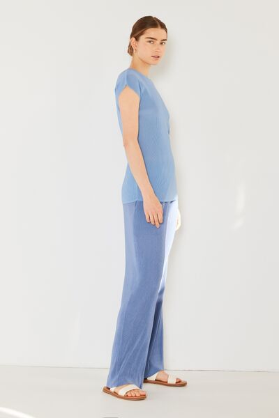 Marina West Swim Rib Pleated Elastic-Waist Wide Leg Pants showcasing ribbed texture and pleats in a stylish design.