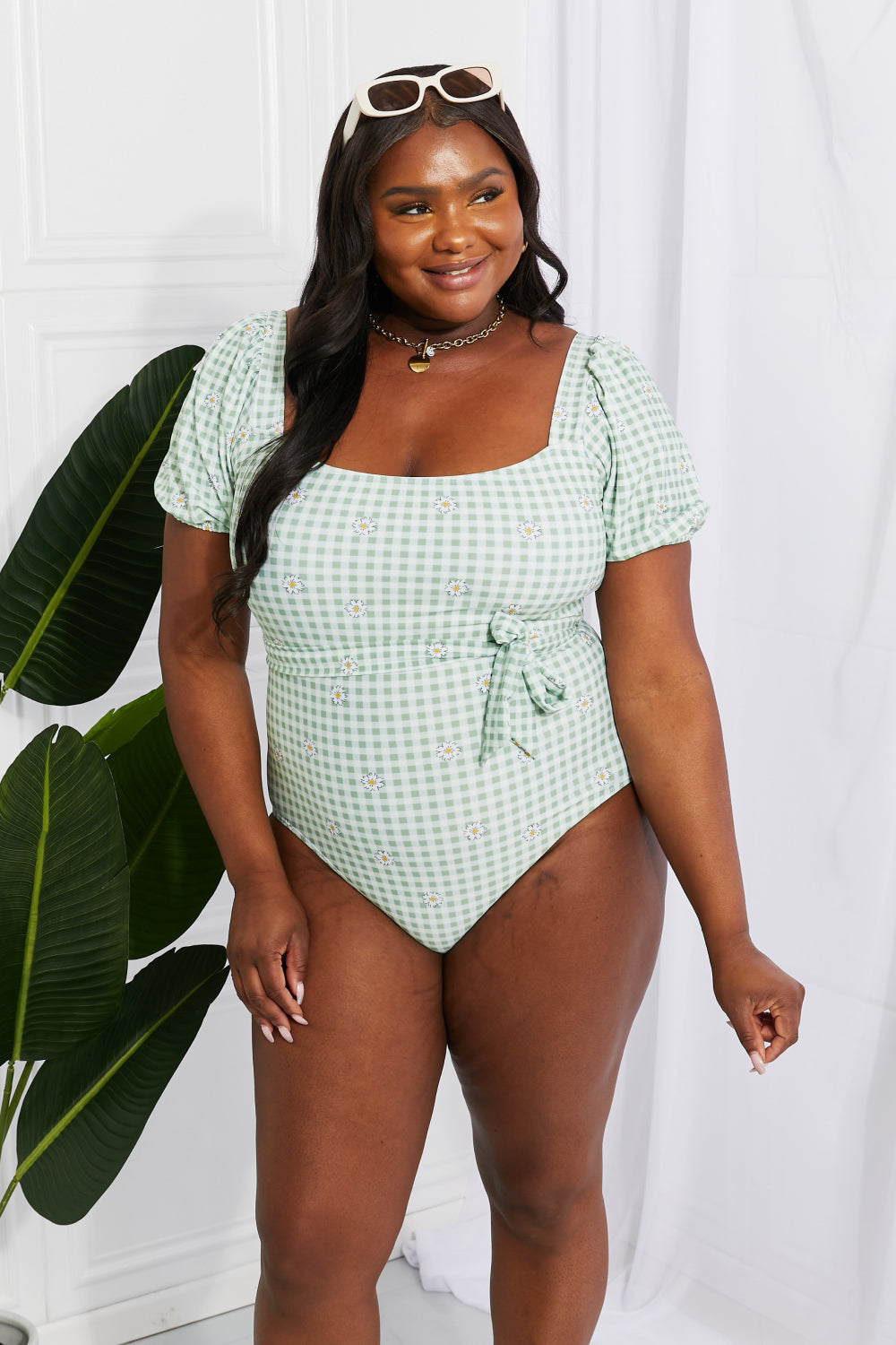 Marina West Swim Salty Air Puff Sleeve One-Piece in Sage featuring puff sleeves and a tie belt, perfect for a cottage-core look.