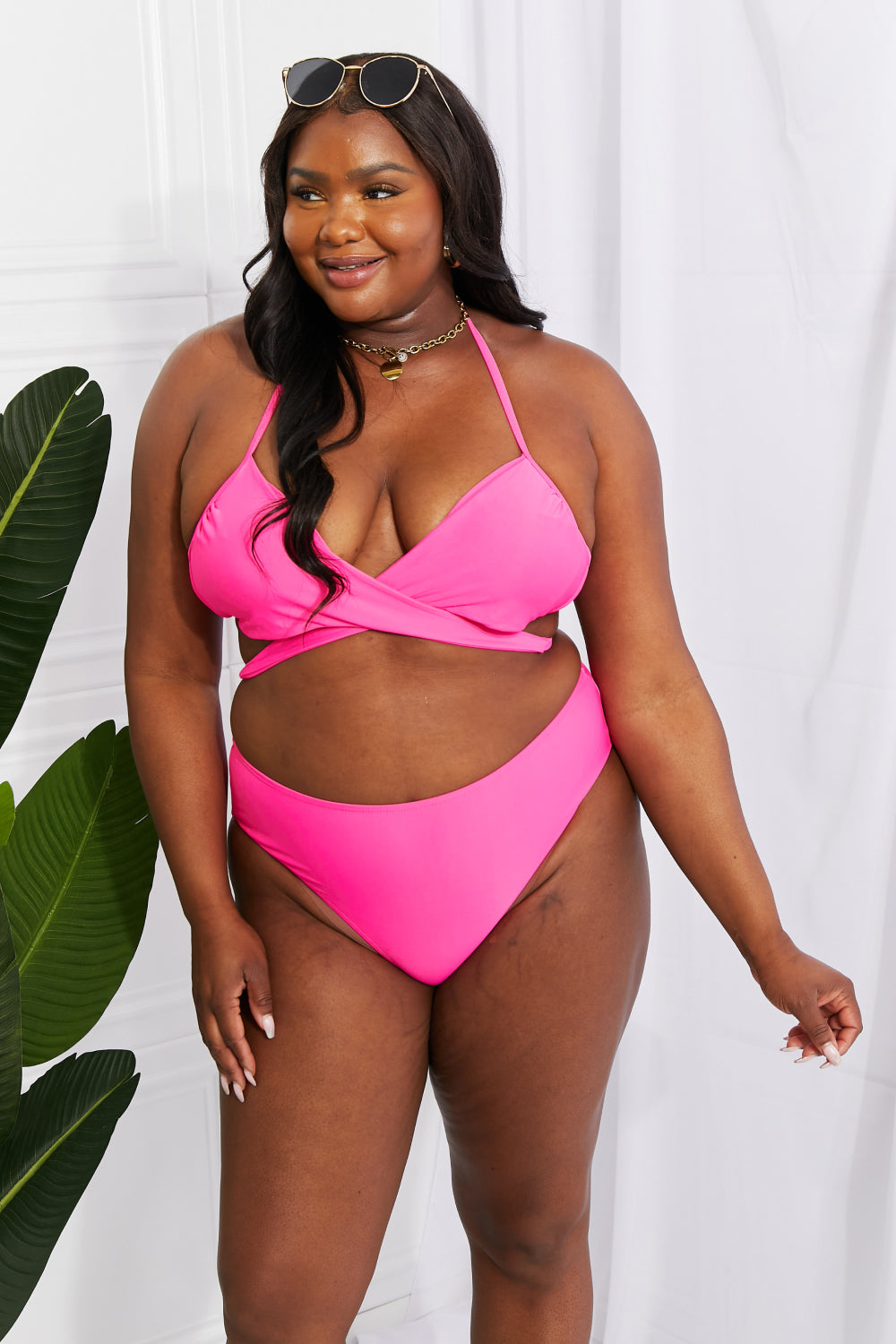 Marina West Swim Summer Splash Halter Bikini Set in Pink featuring a twisted front and double strap design.