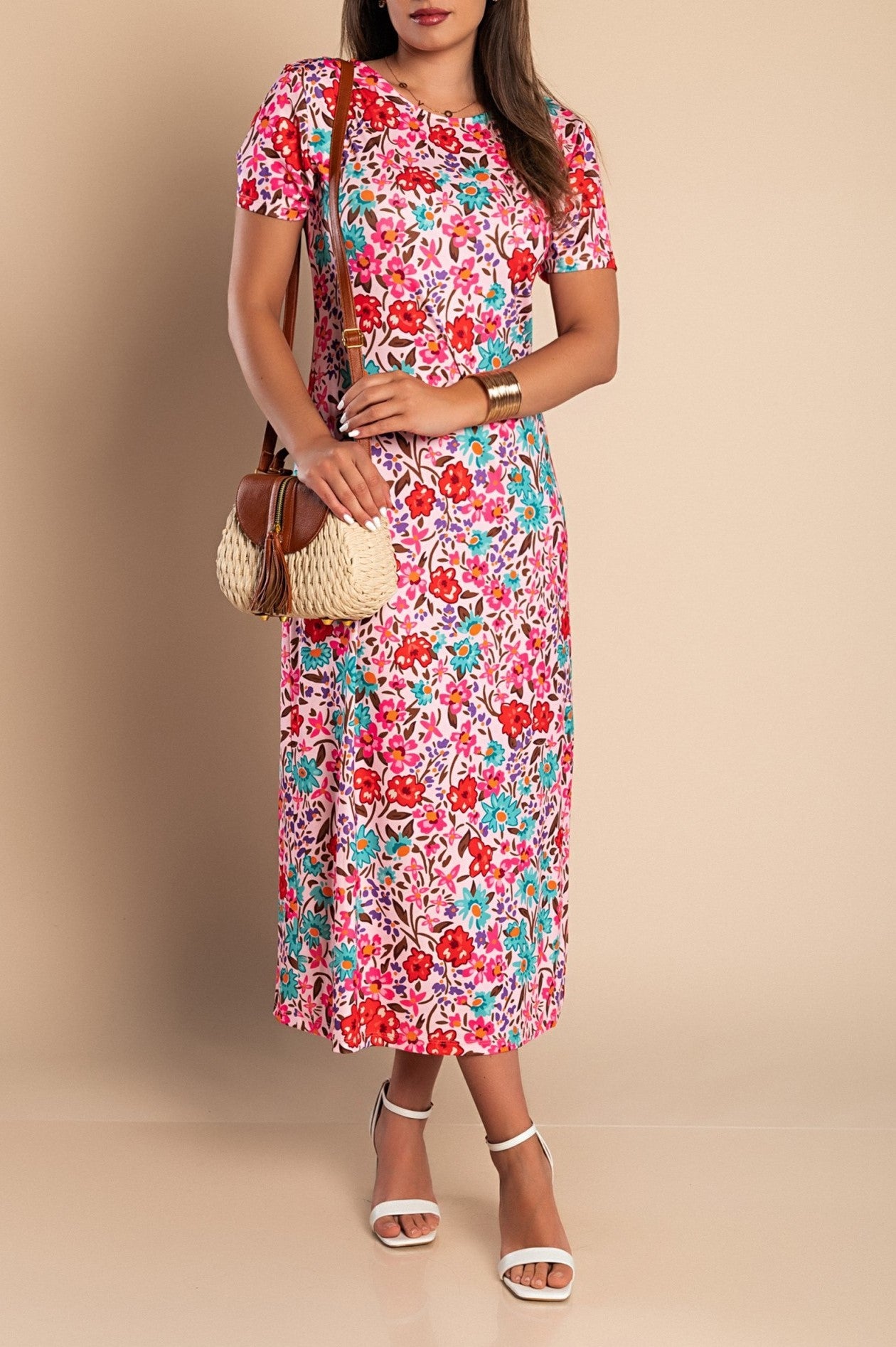 Elegant pink floral print maxi dress with round neckline and short sleeves, made in Italy.