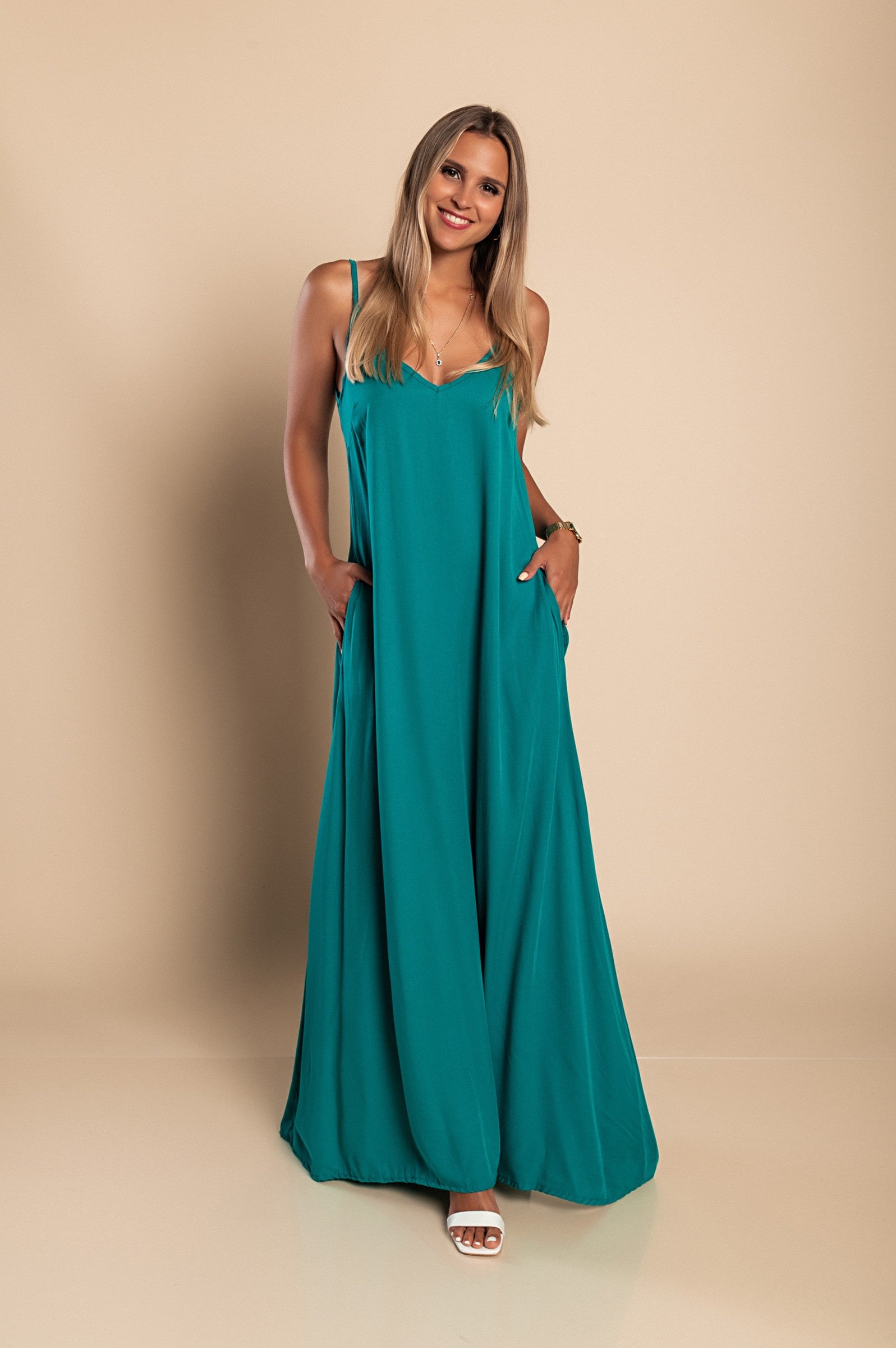 Maxi summer dress Yasmine in mint color, featuring a deep V-neckline and side pockets, made from high-quality viscose fabric.